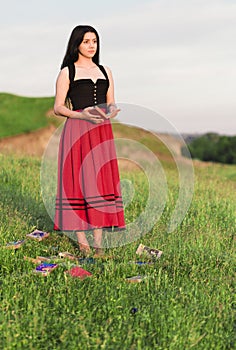 Beautiful Young Girl with Books