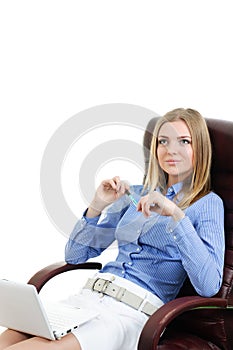 Beautiful young girl in a chair