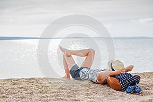 Beautiful young girl enjoying freedom at the beach