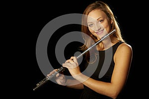 Beautiful young girl with flute