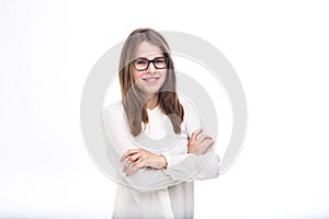 Beautiful young girl in glasses with black frame, with brown hair over shoulders and white shirt on white isolated background.