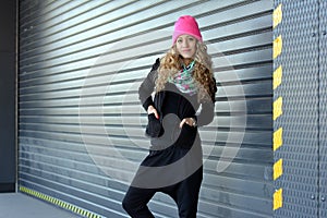 Beautiful young girl posing for garage doors