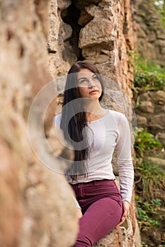 beautiful young girl posing near the river