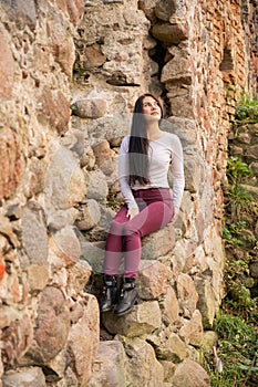 beautiful young girl posing near the river