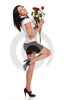 Beautiful young girl posing with a red rose woman isolated