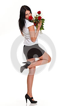 Beautiful young girl posing with a red rose woman isolated