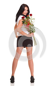 Beautiful young girl posing with a red rose woman isolated