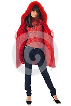 The beautiful Young girl in a red coat