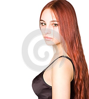 Beautiful young girl with red hair and green eyes