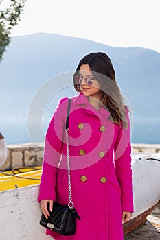 Beautiful young girl resting on the sea photo