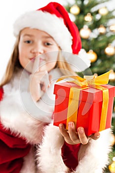 Beautiful young girl in Santa Claus clothes
