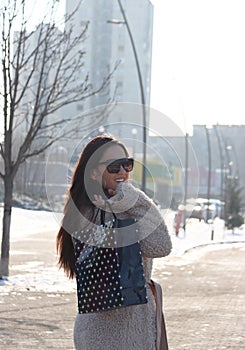 A beautiful young girl shopping. Serbia concept shop.