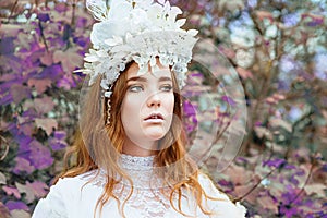 Beautiful young girl snow princess in a crown