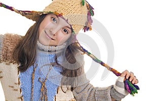 Beautiful young girl wearing hat and gloves