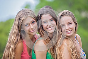 Beautiful young girls with perfect skin teeth and har. photo