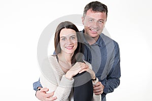 young happy couple love smiling embracing man and woman smile isolated in white background