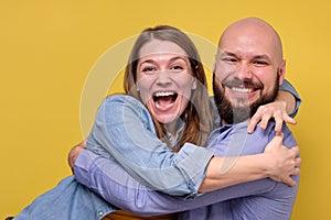 Beautiful young happy smiling caucasian couple hugging