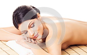 Beautiful, young and healthy woman in spa. Massage, health and healing concept.
