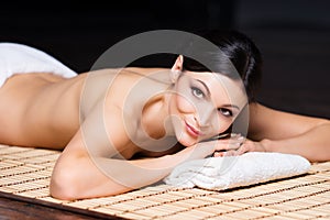 Beautiful, young and healthy woman in spa salon.