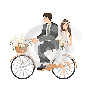 beautiful young just married wedding couple ride bicycle isolated