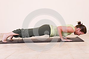 Beautiful young lady doing yoga