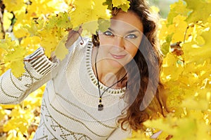 Beautiful young lady in grape vineyard