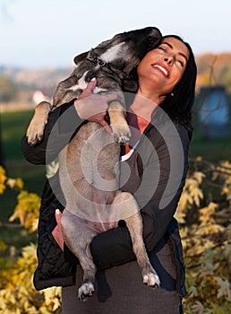 Beautiful young lady with her dog