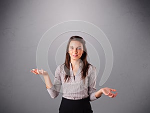 Beautiful young lady juggling with copy space