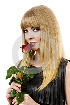 Beautiful young lady with red rose.