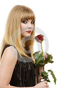Beautiful young lady with red rose.