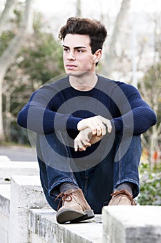 Beautiful young man model, trendy outfit hairstyle