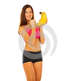 Beautiful young model with bananas, isolated on white background