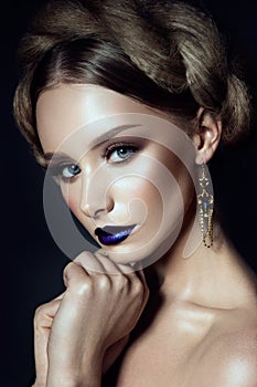 Beautiful young model with blue lips