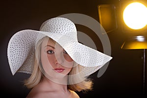 Beautiful young model in hat