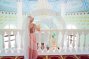 Beautiful young muslim bride preparing for wedding