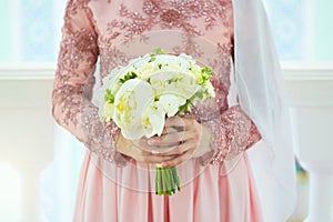 Beautiful young muslim bride preparing for wedding in the Mosque