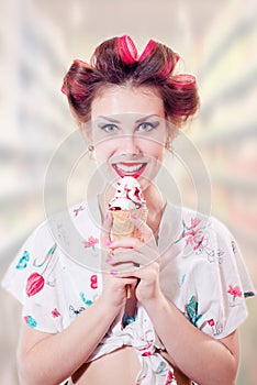 Beautiful young pinup woman eating ice cream cone