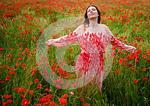 Beautiful young in the poppy field