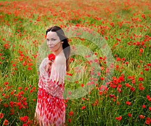 Beautiful young in the poppy field