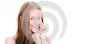 Beautiful young pretty woman portrait smiling cute girl with long hair blonde hands closed under chin on white background