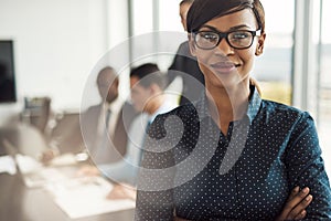 Beautiful young professional woman in office photo