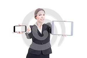 Beautiful young sales woman showing modern technology devices