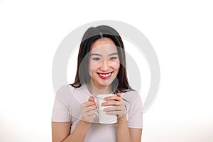 Beautiful young south east Asian woman holding white coffee tea cup emotion expression on white background look down