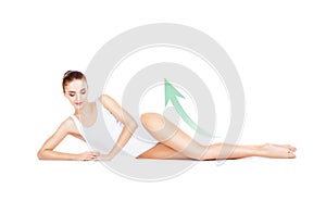 Beautiful, young and sporty girl with arrows isolated on white. Health, sport, fitness, nutrition, weight loss, diet, cellulite r