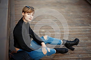 Beautiful young stylish model woman in black fashionable