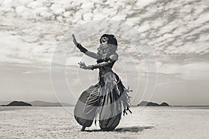 Beautiful young stylish tribal dancer. Woman in oriental costume