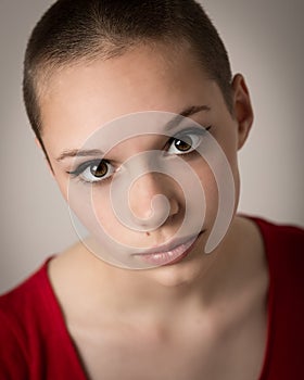 Beautiful Young Teenage Girl With Shaven Head photo