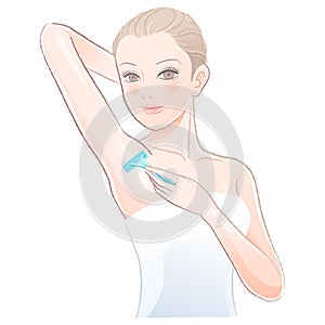 Beautiful young woman applying razor to the shaving armpit