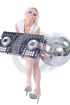 Beautiful Young Woman as DJ playing music on (pickup) mixer.