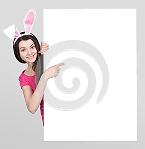 Beautiful young woman as easter bunny